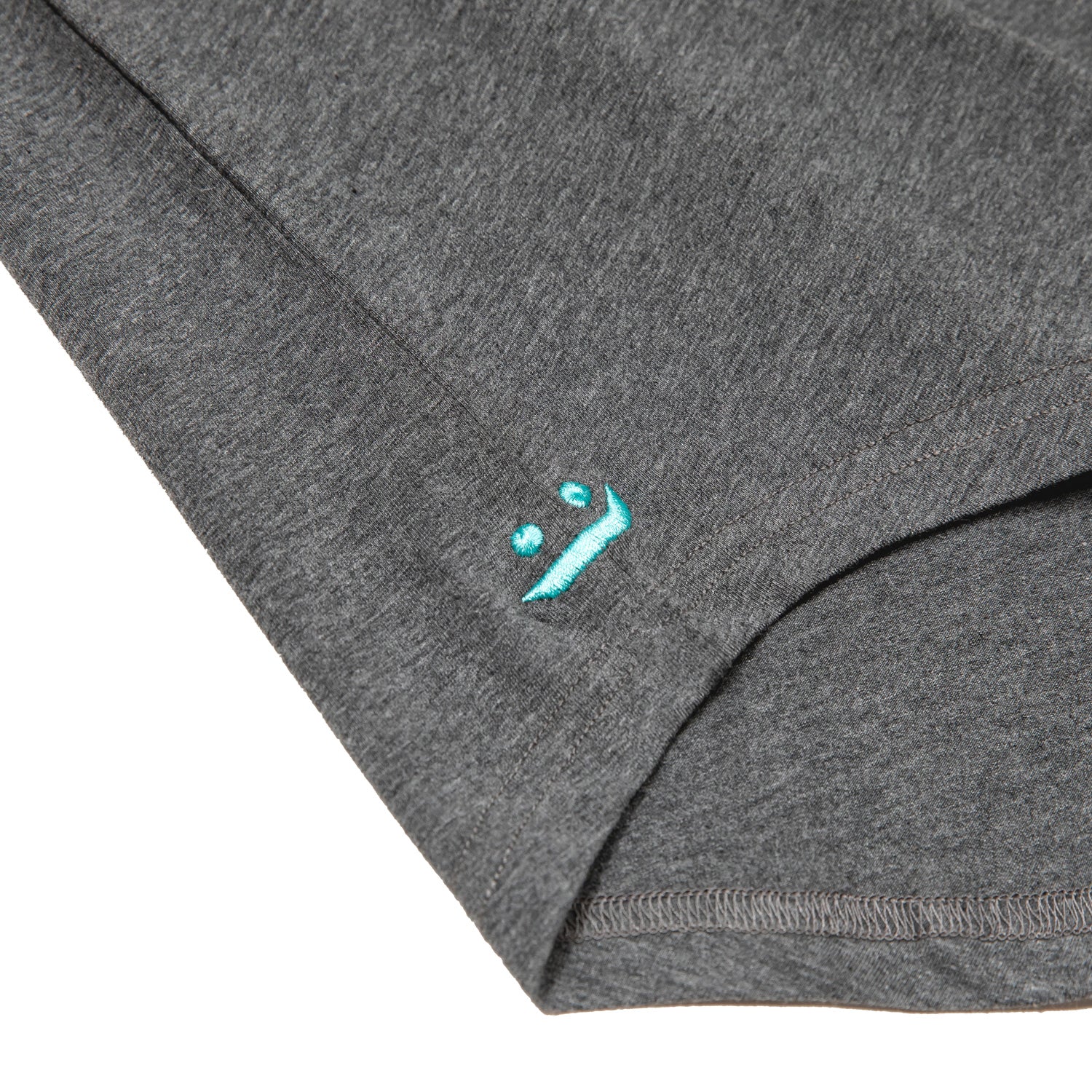 grey T-shirt, tee, front pocket, embroidery signature, iconic, detail view,